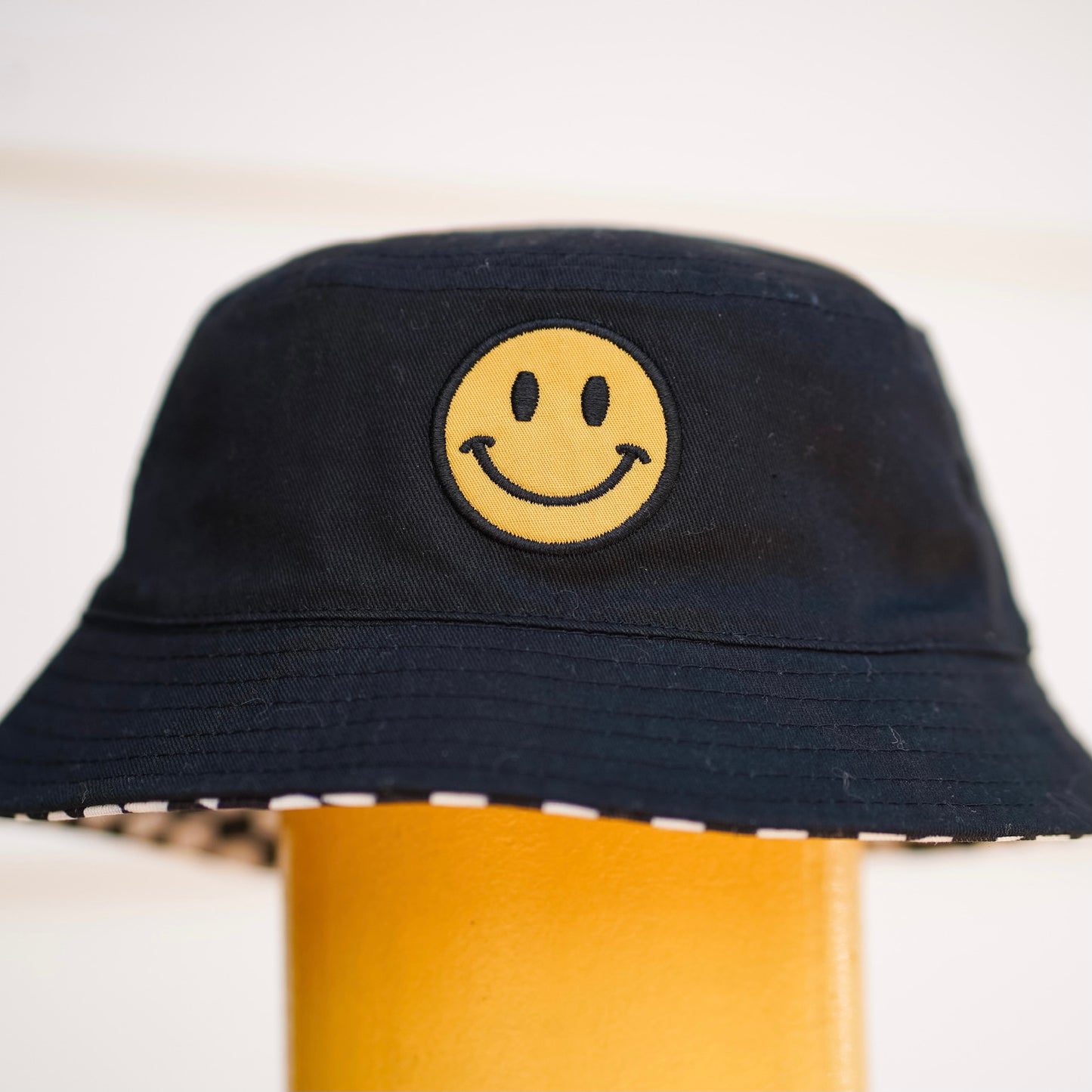 Smile checker bucket hat